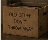 A worn banker box labeled old stuff, don't throw away.